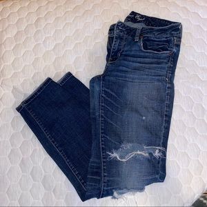 American Eagle ripped blue jeans
